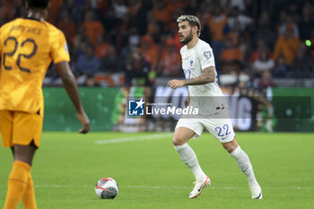 2023-10-13 - Theo Hernandez of France during the UEFA Euro 2024, Qualifiers Group B football match between Netherlands and France on October 13, 2023 at Johan Cruijff ArenA in Amsterdam, Netherlands - FOOTBALL - EURO 2024 - QUALIFYING - NETHERLANDS V FRANCE - UEFA EUROPEAN - SOCCER