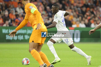2023-10-13 - Rando Kolo Muani of France during the UEFA Euro 2024, Qualifiers Group B football match between Netherlands and France on October 13, 2023 at Johan Cruijff ArenA in Amsterdam, Netherlands - FOOTBALL - EURO 2024 - QUALIFYING - NETHERLANDS V FRANCE - UEFA EUROPEAN - SOCCER