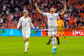 2023-10-13 - Kylian Mbappe of France celebrates the second goal with Antoine Griezmann during the UEFA Euro 2024, Qualifiers Group B football match between Netherlands and France on October 13, 2023 at Johan Cruijff ArenA in Amsterdam, Netherlands - FOOTBALL - EURO 2024 - QUALIFYING - NETHERLANDS V FRANCE - UEFA EUROPEAN - SOCCER