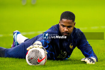 2023-10-13 - Goalkeeper Mike Maignan of France warms up during the UEFA Euro 2024, Qualifiers Group B football match between Netherlands and France on October 13, 2023 at Johan Cruijff ArenA in Amsterdam, Netherlands - FOOTBALL - EURO 2024 - QUALIFYING - NETHERLANDS V FRANCE - UEFA EUROPEAN - SOCCER