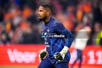 2023-10-13 - Goalkeeper Mike Maignan of France warms up during the UEFA Euro 2024, Qualifiers Group B football match between Netherlands and France on October 13, 2023 at Johan Cruijff ArenA in Amsterdam, Netherlands - FOOTBALL - EURO 2024 - QUALIFYING - NETHERLANDS V FRANCE - UEFA EUROPEAN - SOCCER