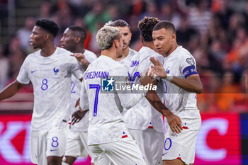 2023-10-13 - Kylian Mbappe of France celebrates after scoring her sides first goal with Antoine Griezmann during the UEFA Euro 2024, Qualifiers Group B football match between Netherlands and France on October 13, 2023 at Johan Cruijff ArenA in Amsterdam, Netherlands - FOOTBALL - EURO 2024 - QUALIFYING - NETHERLANDS V FRANCE - UEFA EUROPEAN - SOCCER
