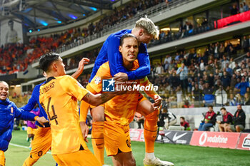 2023-10-16 - Virgil van Dijk of the Netherlands celebrates his goal with teammates during the UEFA Euro 2024, Qualifiers Group B football match between Greece and Netherlands on October 16, 2023 at OPAP Arena in Athens, Greece - FOOTBALL - EURO 2024 - QUALIFYING - GREECE V NETHERLANDS - UEFA EUROPEAN - SOCCER