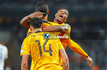 2023-10-16 - Virgil van Dijk of the Netherlands celebrates his goal with Denzel Dumfries, Tijjani Reijnders during the UEFA Euro 2024, Qualifiers Group B football match between Greece and Netherlands on October 16, 2023 at OPAP Arena in Athens, Greece - FOOTBALL - EURO 2024 - QUALIFYING - GREECE V NETHERLANDS - UEFA EUROPEAN - SOCCER
