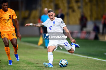 2023-10-16 - Kostas Tsimikas of Greece during the UEFA Euro 2024, Qualifiers Group B football match between Greece and Netherlands on October 16, 2023 at OPAP Arena in Athens, Greece - FOOTBALL - EURO 2024 - QUALIFYING - GREECE V NETHERLANDS - UEFA EUROPEAN - SOCCER