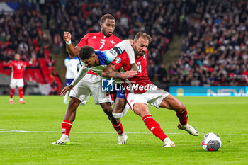 2023-11-17 - Marcus Rashford (11) of England and Steve Borg of Malta during the UEFA Euro 2024, qualifiers Group C football match between England and Malta on 17 November 2023 at Wembley Stadium in London, England - FOOTBALL - EURO 2024 - QUALIFYING - ENGLAND V MALTA - UEFA EUROPEAN - SOCCER