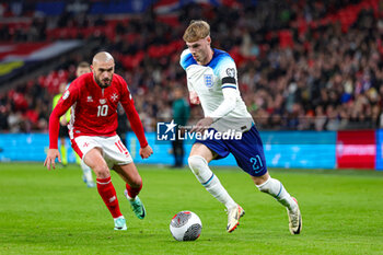 2023-11-17 - Cole Palmer (21) of England and Teddy Teuma of Malta during the UEFA Euro 2024, qualifiers Group C football match between England and Malta on 17 November 2023 at Wembley Stadium in London, England - FOOTBALL - EURO 2024 - QUALIFYING - ENGLAND V MALTA - UEFA EUROPEAN - SOCCER