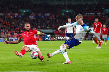 2023-11-17 - Cole Palmer (21) of England and Steve Borg of Malta during the UEFA Euro 2024, qualifiers Group C football match between England and Malta on 17 November 2023 at Wembley Stadium in London, England - FOOTBALL - EURO 2024 - QUALIFYING - ENGLAND V MALTA - UEFA EUROPEAN - SOCCER