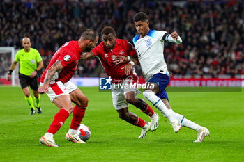 2023-11-17 - Marcus Rashford (11) of England in duel with Joseph Mbong, Steve Borg (4) of Malta during the UEFA Euro 2024, qualifiers Group C football match between England and Malta on 17 November 2023 at Wembley Stadium in London, England - FOOTBALL - EURO 2024 - QUALIFYING - ENGLAND V MALTA - UEFA EUROPEAN - SOCCER