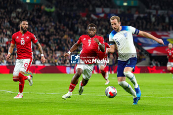 2023-11-17 - Harry Kane (9) of England battles with Joseph Mbong (7) of Malta during the UEFA Euro 2024, qualifiers Group C football match between England and Malta on 17 November 2023 at Wembley Stadium in London, England - FOOTBALL - EURO 2024 - QUALIFYING - ENGLAND V MALTA - UEFA EUROPEAN - SOCCER