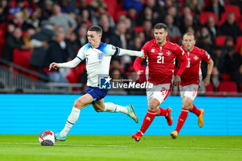 2023-11-17 - Phil Foden (7) of England shoots and Malta concede an own goal 1-0 during the UEFA Euro 2024, qualifiers Group C football match between England and Malta on 17 November 2023 at Wembley Stadium in London, England - FOOTBALL - EURO 2024 - QUALIFYING - ENGLAND V MALTA - UEFA EUROPEAN - SOCCER