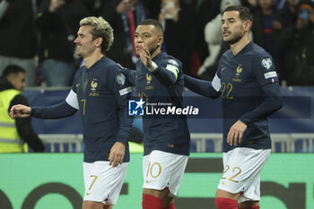 2023-11-18 - Kylian Mbappe of France celebrates his goal with Antoine Griezmann and Theo Hernandez during the UEFA Euro 2024, Qualifiers, Group B football match between France and Gibraltar on November 18, 2023 at Allianz Riviera stadium in Nice, France - FOOTBALL - EURO 2024 - QUALIFYING - FRANCE V GIBRALTAR - UEFA EUROPEAN - SOCCER