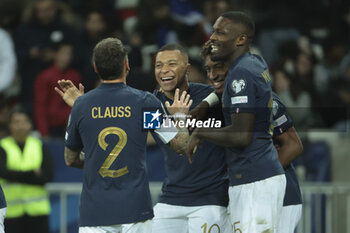 2023-11-18 - Kingsley Coman of France celebrates his goal with Kylian Mbappe and Marcus Thuram during the UEFA Euro 2024, Qualifiers, Group B football match between France and Gibraltar on November 18, 2023 at Allianz Riviera stadium in Nice, France - FOOTBALL - EURO 2024 - QUALIFYING - FRANCE V GIBRALTAR - UEFA EUROPEAN - SOCCER