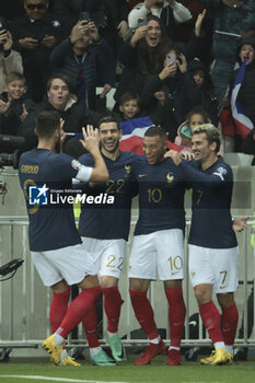 2023-11-18 - Kylian Mbappe of France celebrates his goal with Olivier Giroud, Theo Hernandez, Antoine Griezmann during the UEFA Euro 2024, Qualifiers, Group B football match between France and Gibraltar on November 18, 2023 at Allianz Riviera stadium in Nice, France - FOOTBALL - EURO 2024 - QUALIFYING - FRANCE V GIBRALTAR - UEFA EUROPEAN - SOCCER