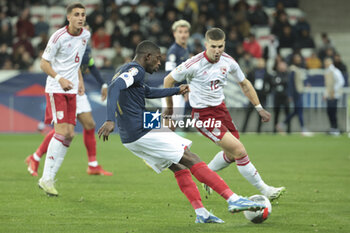 2023-11-18 - Ousmane Dembele of France, Jayce Olivero of Gibraltar during the UEFA Euro 2024, Qualifiers, Group B football match between France and Gibraltar on November 18, 2023 at Allianz Riviera stadium in Nice, France - FOOTBALL - EURO 2024 - QUALIFYING - FRANCE V GIBRALTAR - UEFA EUROPEAN - SOCCER