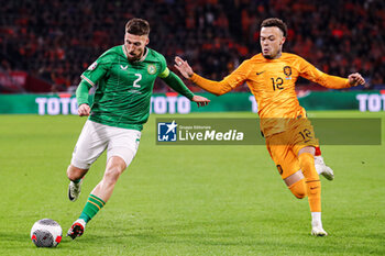 2023-11-18 - Matt Doherty of Ireland, Quilindschy Hartman of The Netherlands during the UEFA EURO 2024, Qualifiers Group B football match between Netherlands and Republic of Ireland on November 18, 2023 at Johan Cruijff ArenA in Amsterdam, Netherlands - FOOTBALL - EURO 2024 - QUALIFYING - NETHERLANDS V REPUBLIC OF IRELAND - UEFA EUROPEAN - SOCCER