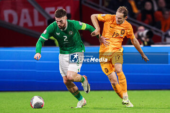 2023-11-18 - Matt Doherty of Ireland, Daley Blind of The Netherlands during the UEFA EURO 2024, Qualifiers Group B football match between Netherlands and Republic of Ireland on November 18, 2023 at Johan Cruijff ArenA in Amsterdam, Netherlands - FOOTBALL - EURO 2024 - QUALIFYING - NETHERLANDS V REPUBLIC OF IRELAND - UEFA EUROPEAN - SOCCER