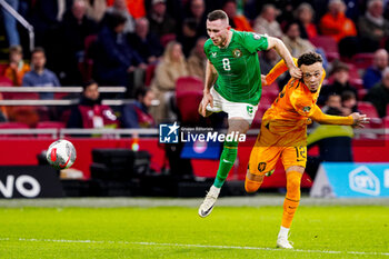 2023-11-18 - Alan Browne of Ireland and Quilindschy Hartman of The Netherlands during the UEFA EURO 2024, Qualifiers Group B football match between Netherlands and Republic of Ireland on November 18, 2023 at Johan Cruijff ArenA in Amsterdam, Netherlands - FOOTBALL - EURO 2024 - QUALIFYING - NETHERLANDS V REPUBLIC OF IRELAND - UEFA EUROPEAN - SOCCER