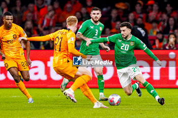 2023-11-18 - Jerdy Schouten of The Netherlands and Mikey Johnston of Ireland during the UEFA EURO 2024, Qualifiers Group B football match between Netherlands and Republic of Ireland on November 18, 2023 at Johan Cruijff ArenA in Amsterdam, Netherlands - FOOTBALL - EURO 2024 - QUALIFYING - NETHERLANDS V REPUBLIC OF IRELAND - UEFA EUROPEAN - SOCCER