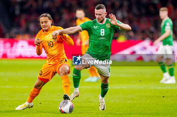 2023-11-18 - Xavi Simons of The Netherlands battles for possession with Alan Browne of Ireland during the UEFA EURO 2024, Qualifiers Group B football match between Netherlands and Republic of Ireland on November 18, 2023 at Johan Cruijff ArenA in Amsterdam, Netherlands - FOOTBALL - EURO 2024 - QUALIFYING - NETHERLANDS V REPUBLIC OF IRELAND - UEFA EUROPEAN - SOCCER