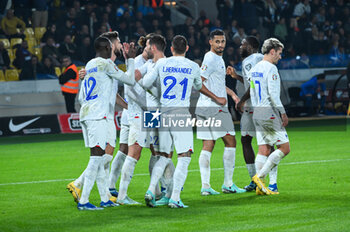 2023-11-21 - 12 Randal Kolo Muani of France celebrates with his teammates after scoring a goal during the European Qualifiers for Euro 24, Group B, match between Greece and France at OPAP Arena on November 21, 2023, in Athens, Greece. - GREECE VS FRANCE, EUROPEAN QUALIFIERS, EURO 2024 - UEFA EUROPEAN - SOCCER