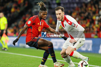 2023-11-19 - Nico Williams of Spain and Otar Kakabadze of Georgia during the UEFA EURO 2024, Qualifiers Group A football match between Spain and Georgia on November 19, 2023 at Jose Zorrilla Stadium in Valladolid, Spain - FOOTBALL - EURO 2024 - QUALIFYING - SPAIN V GEORGIA - UEFA EUROPEAN - SOCCER