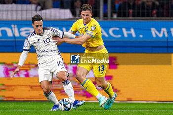2023-11-20 - Giacomo Raspadori of Italy battles for possession with Illia Zabarnyi of Ukraine during the UEFA Euro 2024, Qualifiers Group C football match between Ukraine and Italy on November 20, 2023 at BayArena in Leverkusen, Germany - FOOTBALL - EURO 2024 - QUALIFYING - UKRAINE V ITALY - UEFA EUROPEAN - SOCCER