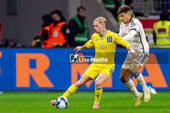 2023-11-20 - Mykhailo Mudryk of Ukraine battles for possession with Giovanni Di Lorenzo of Italy during the UEFA Euro 2024, Qualifiers Group C football match between Ukraine and Italy on November 20, 2023 at BayArena in Leverkusen, Germany - FOOTBALL - EURO 2024 - QUALIFYING - UKRAINE V ITALY - UEFA EUROPEAN - SOCCER