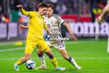 2023-11-20 - Georgiy Sudakov of Ukraine battles for possession with Nicolo Barella of Italy during the UEFA Euro 2024, Qualifiers Group C football match between Ukraine and Italy on November 20, 2023 at BayArena in Leverkusen, Germany - FOOTBALL - EURO 2024 - QUALIFYING - UKRAINE V ITALY - UEFA EUROPEAN - SOCCER