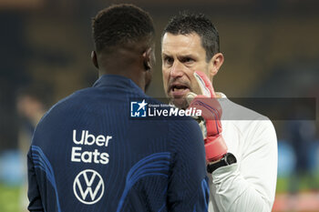 2023-11-21 - France goalkeeper Brice Samba and goalkeeping coach of France Franck Raviot during the UEFA Euro 2024, Qualifiers, Group B football match between Greece and France on November 21, 2023 at OPAP Arena in Athens, Greece - FOOTBALL - EURO 2024 - QUALIFYING - GREECE V FRANCE - UEFA EUROPEAN - SOCCER