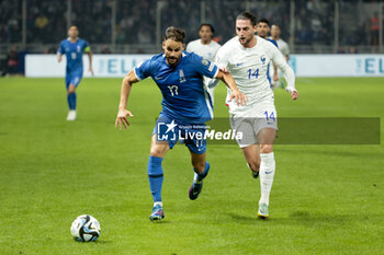 2023-11-21 - Pantelis Hatzidiakos of Greece, Adrien Rabiot of France during the UEFA Euro 2024, Qualifiers, Group B football match between Greece and France on November 21, 2023 at OPAP Arena in Athens, Greece - FOOTBALL - EURO 2024 - QUALIFYING - GREECE V FRANCE - UEFA EUROPEAN - SOCCER