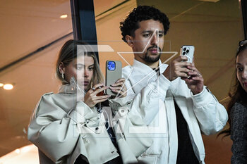 2023-03-22 - MARQUINHOS of PSG with his wife Carol CABRINO during the UEFA Women's Champions League, Quarter-finals, 1st leg football match between Paris Saint-Germain and VfL Wolfsburg on March 22, 2023 at Parc des Princes stadium in Paris, France - FOOTBALL - WOMEN'S CHAMPIONS LEAGUE - PARIS SG V WOLFSBURG - UEFA CHAMPIONS LEAGUE WOMEN - SOCCER
