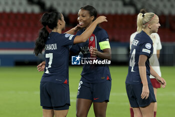2023-10-18 - Grace Geyoro and Sakina Karchaoui (left) of PSG celebrate the victory following the UEFA Women's Champions League, Round 2, 2nd leg football match between Paris Saint-Germain and Manchester United on October 18, 2023 at Parc des Princes stadium in Paris, France - FOOTBALL - WOMEN'S CHAMPIONS LEAGUE - PARIS SG V MANCHESTER UNITED - UEFA CHAMPIONS LEAGUE WOMEN - SOCCER