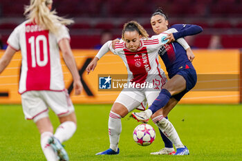 2023-11-15 - Chasity Grant of AFC Ajax and Sakina Karchaoui of Paris Saint-Germain during the UEFA Women's Champions League, Group C football match between AFC Ajax and Paris Saint-Germain on November 15, 2023 at the Johan Cruijff ArenA in Amsterdam, Netherlands - FOOTBALL - WOMEN'S CHAMPIONS LEAGUE - AJAX V PARIS SG - UEFA CHAMPIONS LEAGUE WOMEN - SOCCER