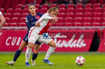 2023-11-15 - Chasity Grant of AFC Ajax and Sakina Karchaoui of Paris Saint-Germain during the UEFA Women's Champions League, Group C football match between AFC Ajax and Paris Saint-Germain on November 15, 2023 at the Johan Cruijff ArenA in Amsterdam, Netherlands - FOOTBALL - WOMEN'S CHAMPIONS LEAGUE - AJAX V PARIS SG - UEFA CHAMPIONS LEAGUE WOMEN - SOCCER