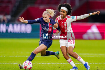 2023-11-15 - Jackie Groenen of Paris Saint-Germain battle for possession with Lilian Isabella Yohannes of AFC Ajax during the UEFA Women's Champions League, Group C football match between AFC Ajax and Paris Saint-Germain on November 15, 2023 at the Johan Cruijff ArenA in Amsterdam, Netherlands - FOOTBALL - WOMEN'S CHAMPIONS LEAGUE - AJAX V PARIS SG - UEFA CHAMPIONS LEAGUE WOMEN - SOCCER