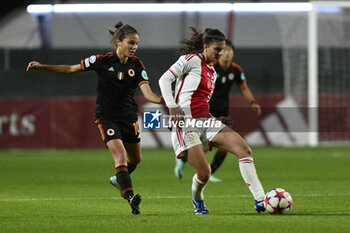 2023-11-23 - Manuela Giugliano of A.S. Roma Women and Danique Noordman of A.F.C. Ajax during the Round 2, day 2 Group C of the UEFA Women's Champions League between F.C. Vorskla vs A.S. Roma, 23 November 2023 at the Stadio Tre Fontane in Rome, Italy. - ROMA WOMEN VS AJAX WOMEN - UEFA CHAMPIONS LEAGUE WOMEN - SOCCER