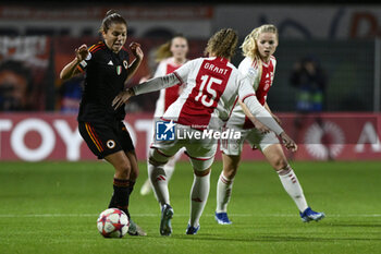2023-11-23 - Manuela Giugliano of A.S. Roma Women and Chasity Grant of A.F.C. Ajax during the Round 2, day 2 Group C of the UEFA Women's Champions League between F.C. Vorskla vs A.S. Roma, 23 November 2023 at the Stadio Tre Fontane in Rome, Italy. - ROMA WOMEN VS AJAX WOMEN - UEFA CHAMPIONS LEAGUE WOMEN - SOCCER