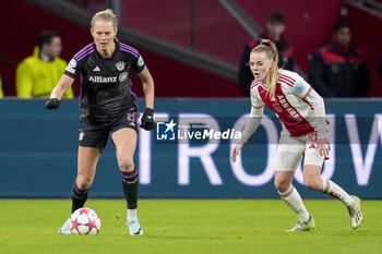 2023-12-20 - Maximiliane Rall of Bayern Munich and Milicia Keijzer of AFC Ajax during the UEFA Women's Champions League, Group C football match between AFC Ajax and Bayern Munich on December 20, 2023 at Johan Cruijff ArenA in Amsterdam, Netherlands - FOOTBALL - WOMEN'S CHAMPIONS LEAGUE - AJAX V BAYERN MUNICH - UEFA CHAMPIONS LEAGUE WOMEN - SOCCER