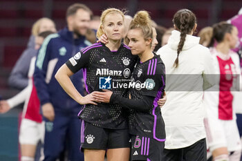 2023-12-20 - Glódís Viggósdóttir and Lina Magull of Bayern Munich during the UEFA Women's Champions League, Group C football match between AFC Ajax and Bayern Munich on December 20, 2023 at Johan Cruijff ArenA in Amsterdam, Netherlands - FOOTBALL - WOMEN'S CHAMPIONS LEAGUE - AJAX V BAYERN MUNICH - UEFA CHAMPIONS LEAGUE WOMEN - SOCCER
