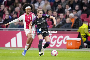 2023-12-20 - Sydney Lohmann of Bayern Munich and Liliy Yohannes of AFC Ajax during the UEFA Women's Champions League, Group C football match between AFC Ajax and Bayern Munich on December 20, 2023 at Johan Cruijff ArenA in Amsterdam, Netherlands - FOOTBALL - WOMEN'S CHAMPIONS LEAGUE - AJAX V BAYERN MUNICH - UEFA CHAMPIONS LEAGUE WOMEN - SOCCER