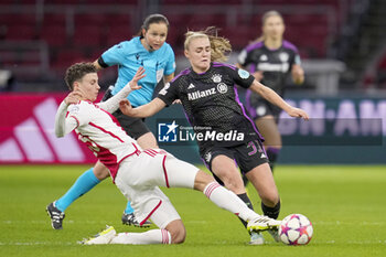 2023-12-20 - Kay-Lee de Sanders of AFC Ajax and Georgia Stanway of Bayern Munich during the UEFA Women's Champions League, Group C football match between AFC Ajax and Bayern Munich on December 20, 2023 at Johan Cruijff ArenA in Amsterdam, Netherlands - FOOTBALL - WOMEN'S CHAMPIONS LEAGUE - AJAX V BAYERN MUNICH - UEFA CHAMPIONS LEAGUE WOMEN - SOCCER
