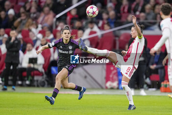 2023-12-20 - Sherida Spitse of AFC Ajax and Jovana Damnjanovic of Bayern Munich during the UEFA Women's Champions League, Group C football match between AFC Ajax and Bayern Munich on December 20, 2023 at Johan Cruijff ArenA in Amsterdam, Netherlands - FOOTBALL - WOMEN'S CHAMPIONS LEAGUE - AJAX V BAYERN MUNICH - UEFA CHAMPIONS LEAGUE WOMEN - SOCCER