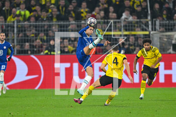 2023-02-15 - Chelsea forward Joao Felix controls the ball under pressure from Borussia Dortmund defender Nico Schlotterbeck (4) during the UEFA Champions League, Round of 16, 1st leg football match between Borussia Dortmund and Chelsea on February 15, 2023 at Signal Iduna Park in Dortmund, Germany - FOOTBALL - CHAMPIONS LEAGUE - DORTMUND V CHELSEA - UEFA CHAMPIONS LEAGUE - SOCCER