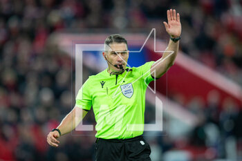 2023-02-21 - Referee Istvan Kovacs during the UEFA Champions League, Round of 16, 1st leg football match between Liverpool and Real Madrid on 21 February 2023 at Anfield in Liverpool, England - FOOTBALL - CHAMPIONS LEAGUE - LIVERPOOL V REAL MADRID - UEFA CHAMPIONS LEAGUE - SOCCER