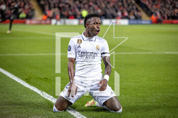 2023-02-21 - Real Madrid forward Vinicius Junior (20) scores and celebrates 2-2 during the UEFA Champions League, Round of 16, 1st leg football match between Liverpool and Real Madrid on 21 February 2023 at Anfield in Liverpool, England - FOOTBALL - CHAMPIONS LEAGUE - LIVERPOOL V REAL MADRID - UEFA CHAMPIONS LEAGUE - SOCCER