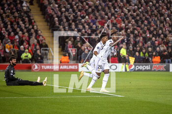2023-02-21 - Real Madrid forward Vinicius Junior (20) scores and celebrates 2-1 during the UEFA Champions League, Round of 16, 1st leg football match between Liverpool and Real Madrid on 21 February 2023 at Anfield in Liverpool, England - FOOTBALL - CHAMPIONS LEAGUE - LIVERPOOL V REAL MADRID - UEFA CHAMPIONS LEAGUE - SOCCER