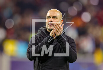 2023-02-23 - Pep Guardiola Head Coach of Manchester City during the UEFA Champions League, Round of 16, 1st leg football match between RB Leipzig and Manchester City on February 22, 2023 at Red Bull Arena in Leipzig, Germany - FOOTBALL - CHAMPIONS LEAGUE - LEIPZIG V MANCHESTER CITY - UEFA CHAMPIONS LEAGUE - SOCCER