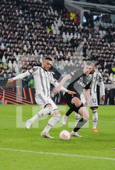 2023-03-09 - Filip Kostic of Juventus and Roland Sallai of SC Freiburg during the Uefa Europa League, football match between Juventus and Freiburg on 09 March 2023 at Allianz Stadium, Turin, Italy Photo Ndrerim Kaceli - JUVENTUS FC VS SC FREIBURG - UEFA EUROPA LEAGUE - SOCCER