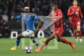 2023-03-15 - Victor Osimhen of SSC Napoli  competes for the ball with Evan N'Dicka of Eintracht Frankfurt  during the Uefa Champions League  match between SSC Napoli v Eintracht Frankfurt  at Diego Armando Maradona Stadium  - SSC NAPOLI VS EINTRACHT FRANKFURT - UEFA CHAMPIONS LEAGUE - SOCCER